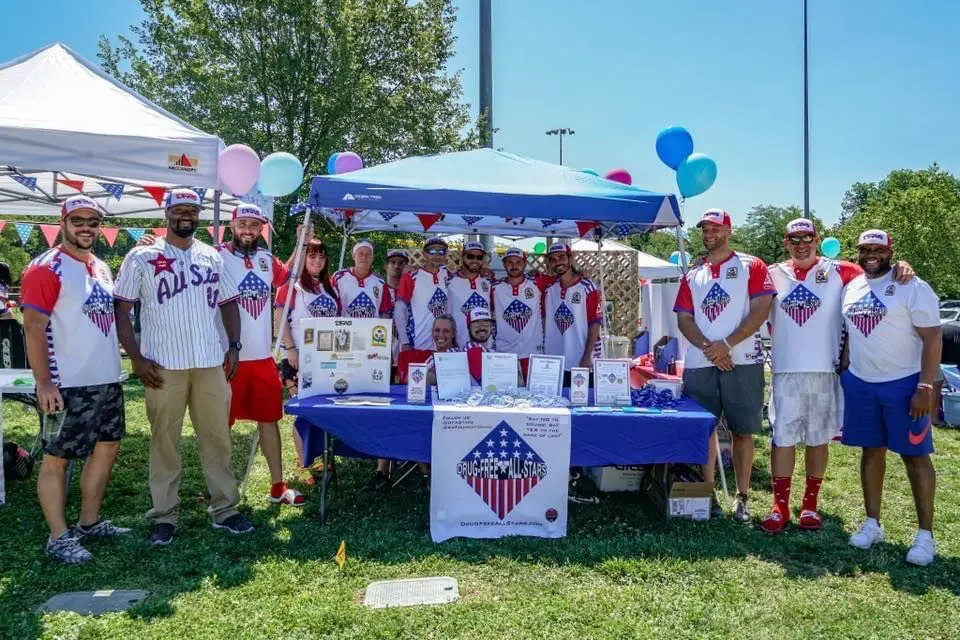 Organization wearing matching patriotic t-shirts | Source