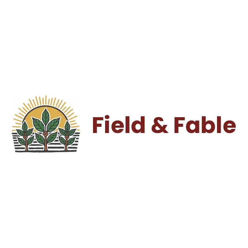 The cafe name Field & Fable as a branded logo in a linocut style