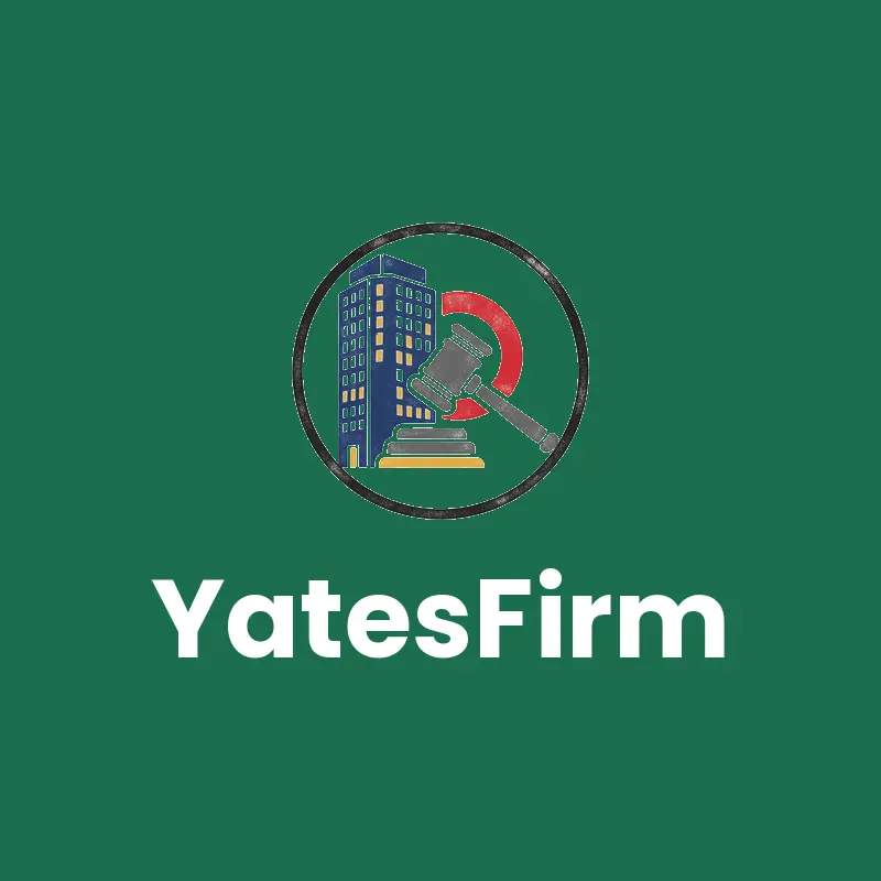 Linocut law office logo for YatesFirm with a gavel in front of an office tower on forest green