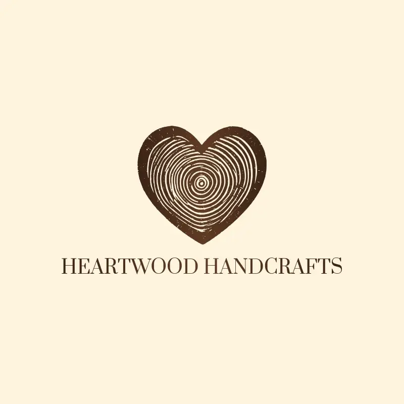 The woodworking name Heartwood Handcrafts as a branded logo with a single color icon