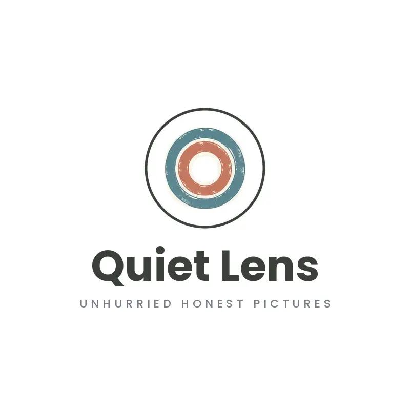 The photography name Quiet Lens as a branded logo in a linocut style