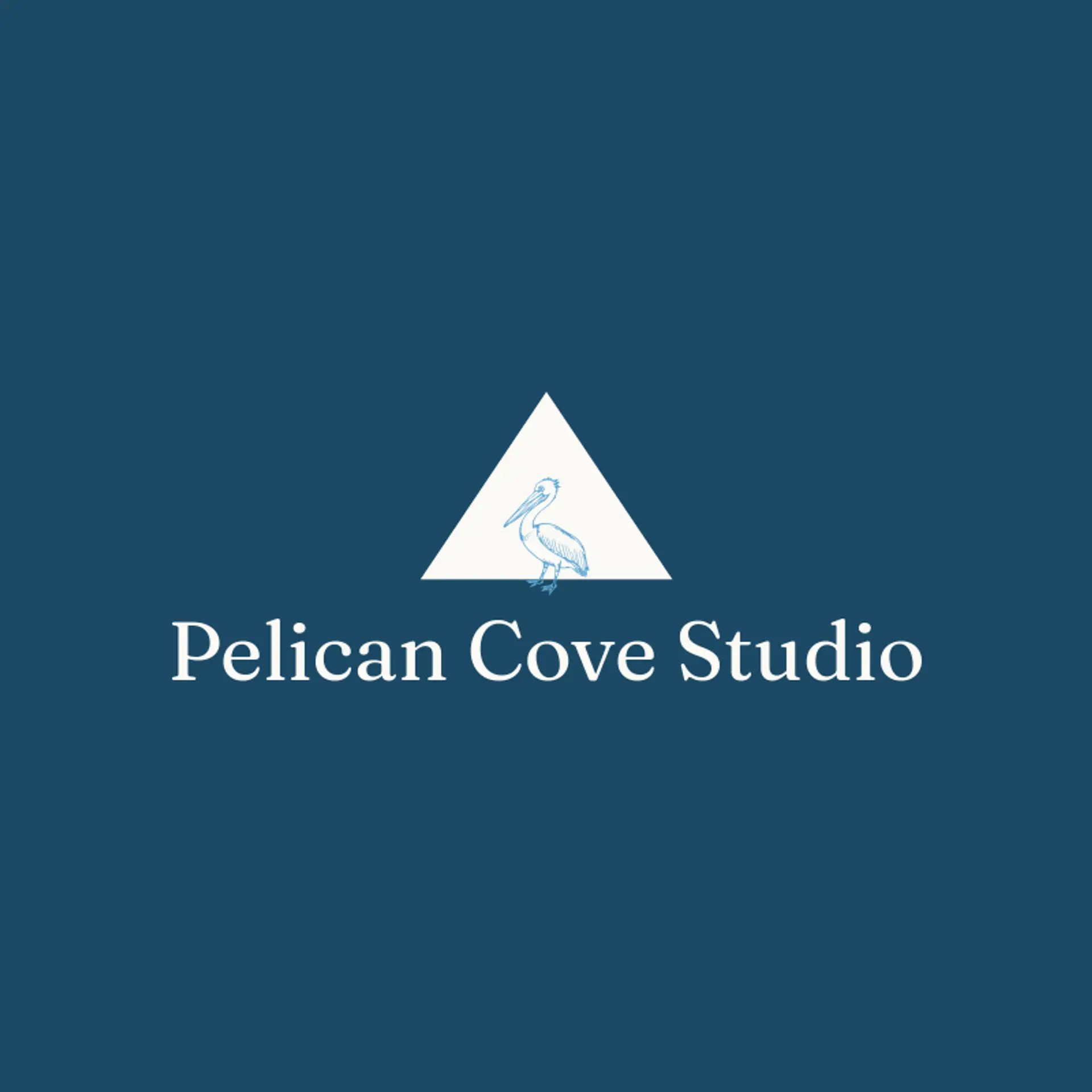 Pelican Cove Studio logo for pelican