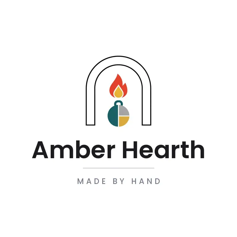 The Etsy shop name Amber Hearth as a branded logo in a minimal style